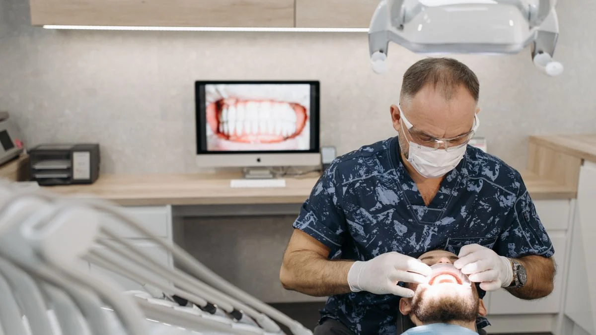 A patient beginning dental treatment, representing coverage that starts without a waiting period