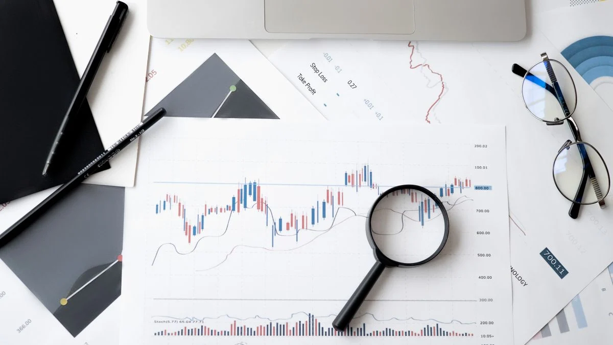 Fact-checking Spirit Dental’s no-waiting-period claim Magnifying glass over financial documents, representing an independent fact-check of Spirit Dental's no-waiting-period marketing claim